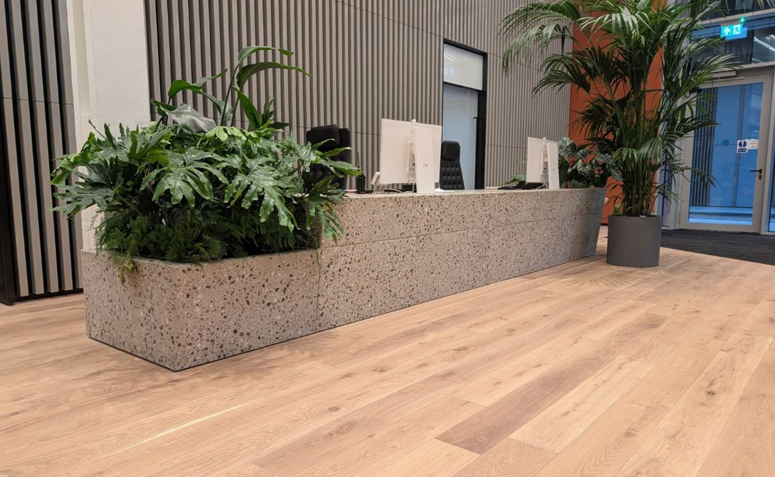 bespoke terrazzo reception desk at 100 Fetter